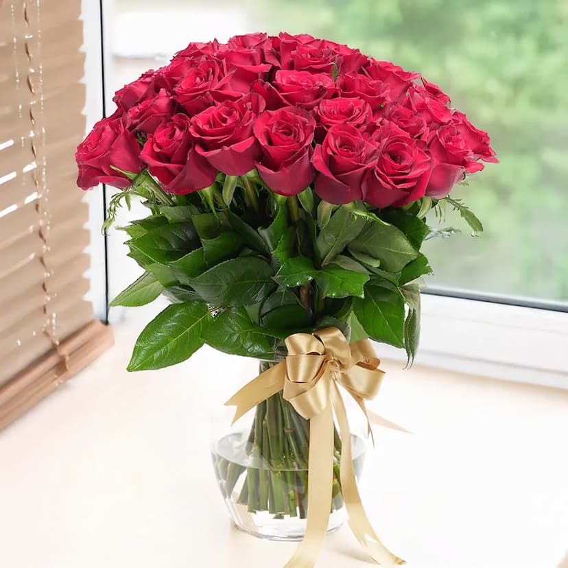 Red Roses in a Glass Vase