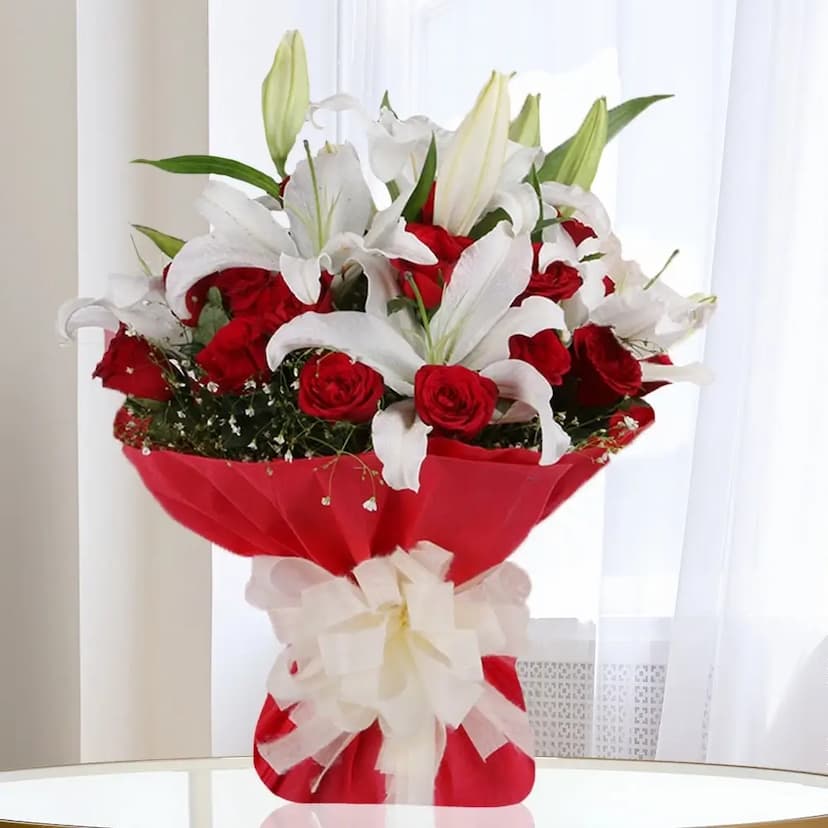 15 red roses and 3 white lilies bouquet