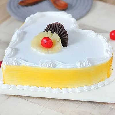 Eggless Heart Shape Pineapple Cake