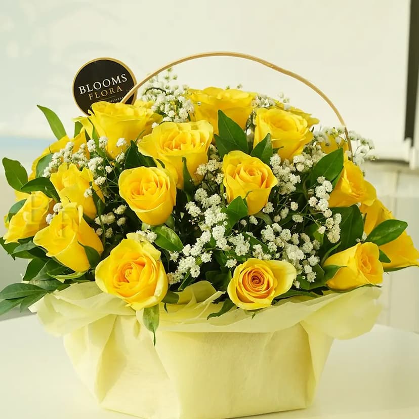 25 yellow roses in a basket