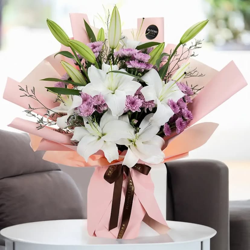 bouquet of 4 white lilies and 5 purple chrysanthemums