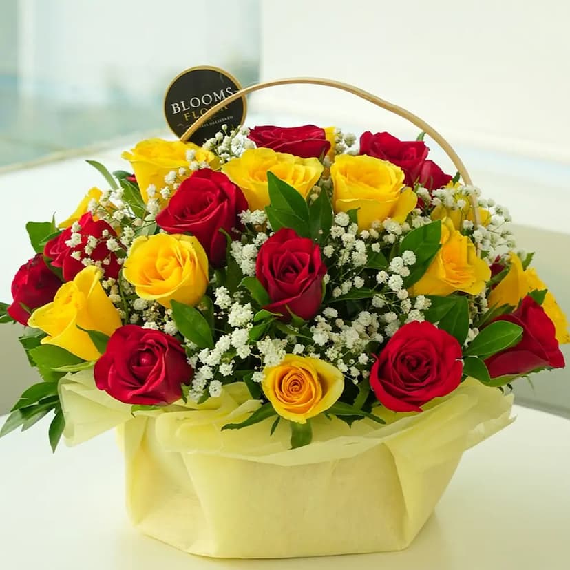 15 red roses and 15 yellow roses in basket