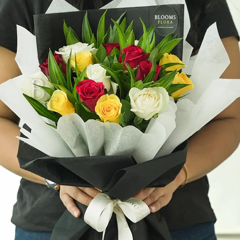 5 yellow roses, 5 red rose, and 5 white roses bouquet