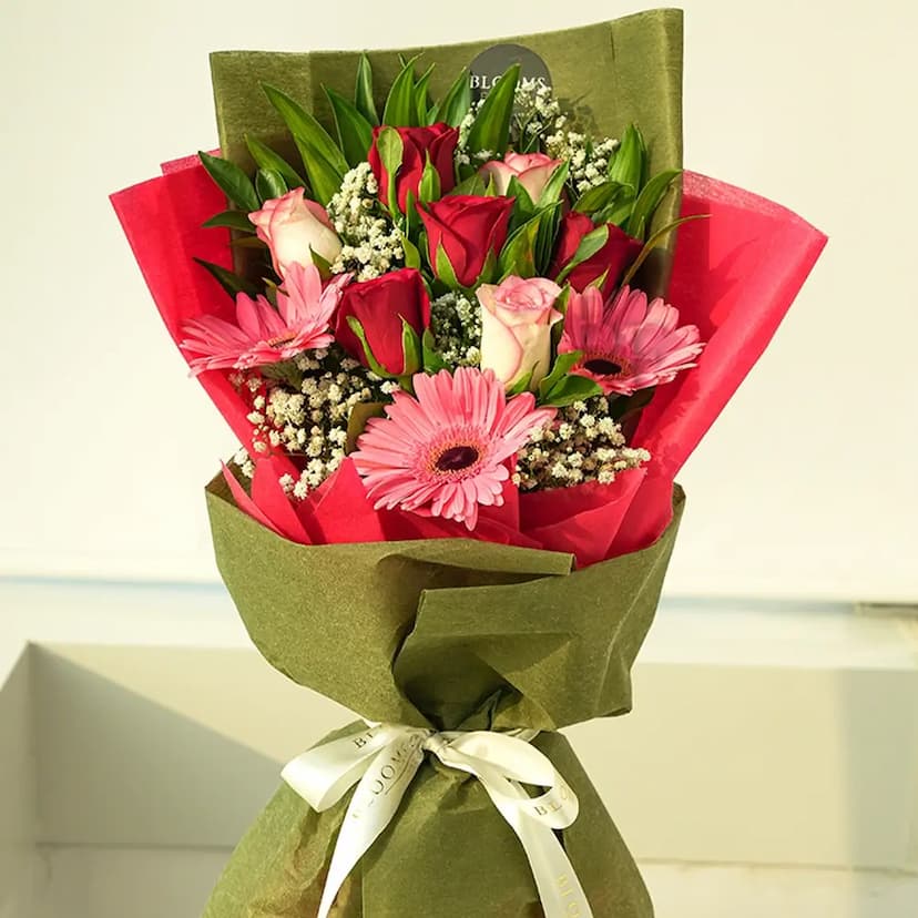 3 pink gerberas, 5 red roses and 5 pink roses bouquet