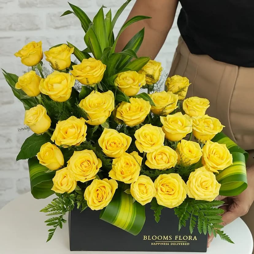 30 yellow roses in a black box