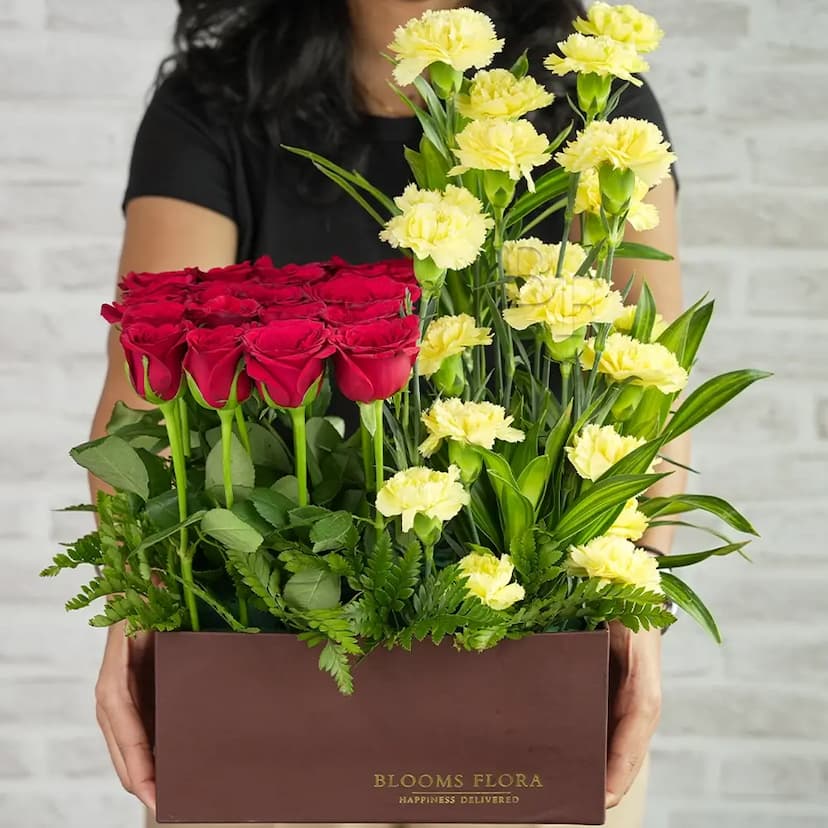 20 red roses and 20 yellow carnations in a box