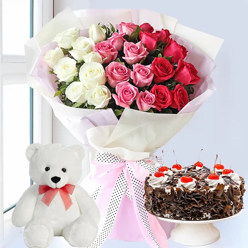 25 red, pink and white roses bouquet with teddy bear and half Kg black forest Cake