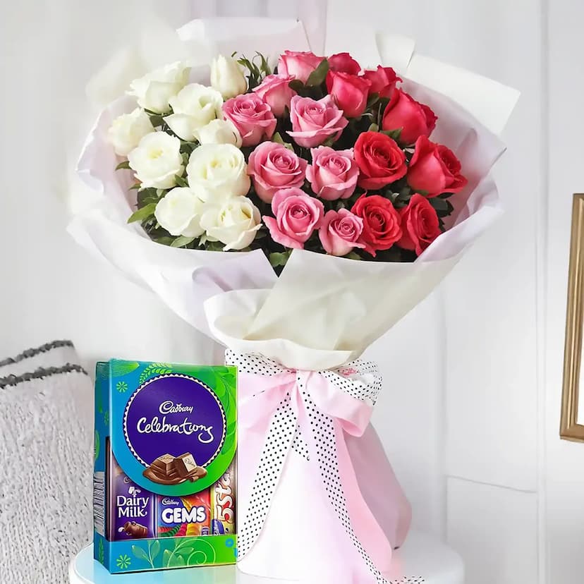 21 red, white and pink roses with cadbury celebration box