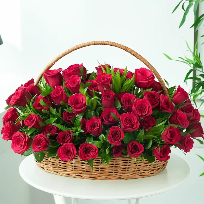 100 red roses in a basket